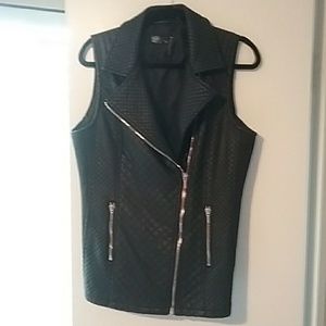 Leather like vest
